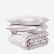 Stripe duvet cover and sham set folded and stacked