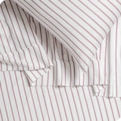 Close up of sheets and pillowcase on a bed