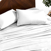 Close up of bamboo sheets and pillowcases on a bed