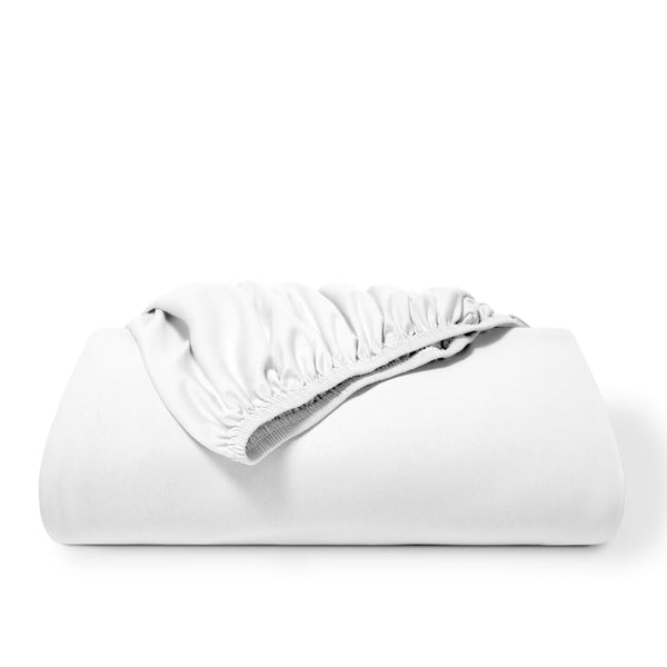 A white fitted sheet folded