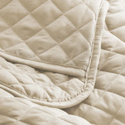 Close in view showing texture of coverlet set fabric