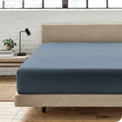 Modern bedroom with a fitted sheet which fits deep mattresses up to 15 inches