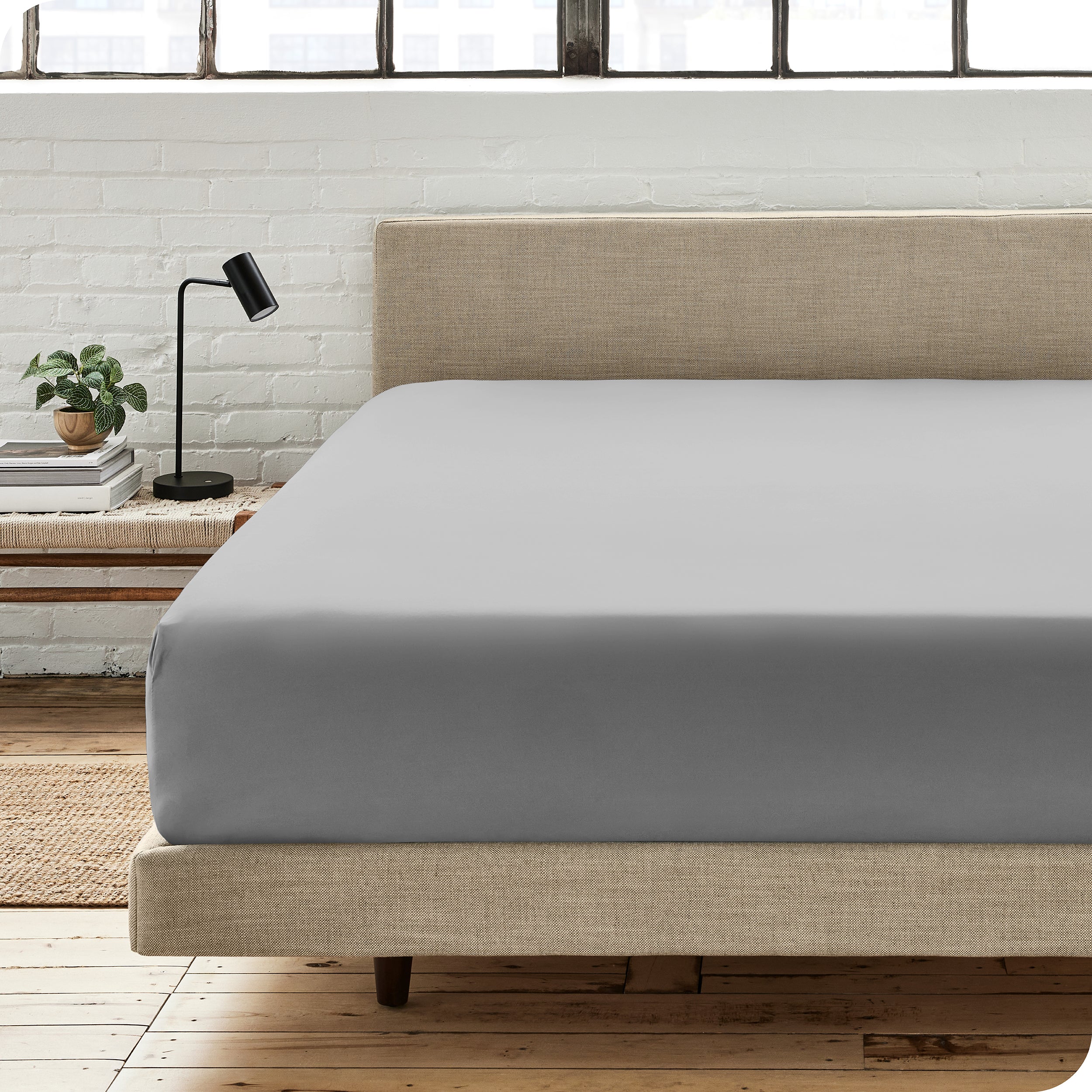 Modern bedroom with a fitted sheet which fits deep mattresses up to 15 inches