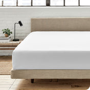 Modern bedroom with a fitted sheet which fits deep mattresses up to 15 inches