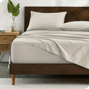 Modern wood bed made with percale sheet set