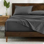 Modern wood bed made with percale sheet set